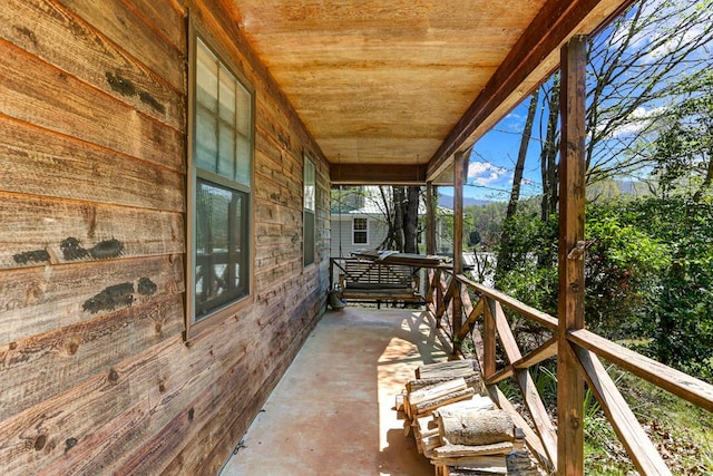 view of terrace with a porch