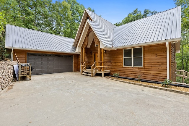 log home with a garage