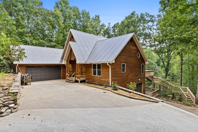 cabin featuring a garage