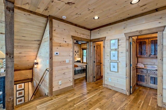 interior space with wood walls, light wood-type flooring, recessed lighting, and wood ceiling