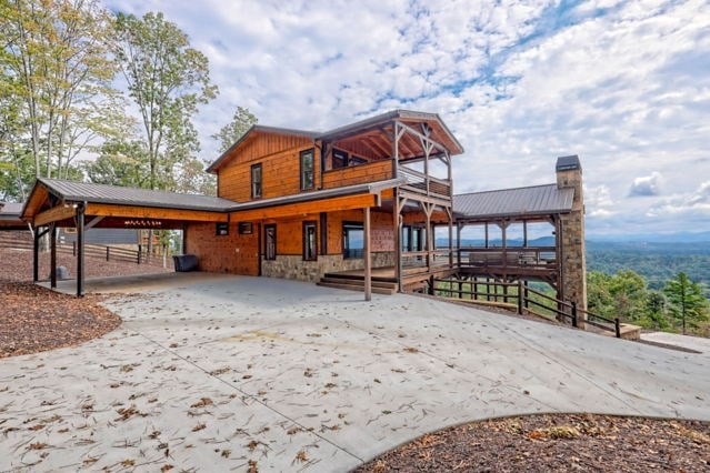 view of front of house featuring a carport