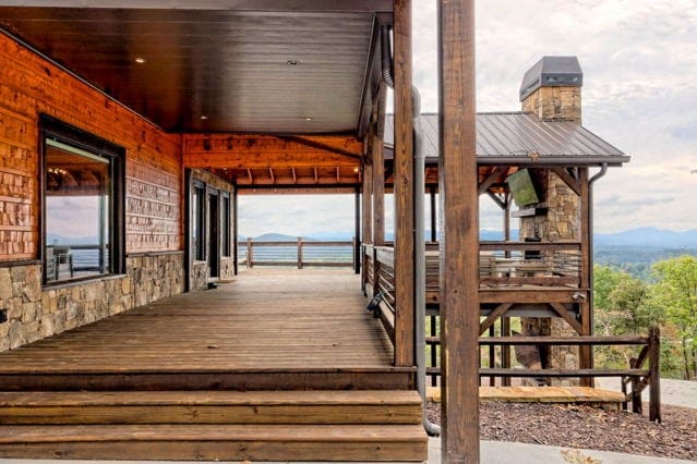 wooden terrace featuring a mountain view
