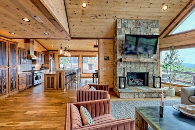 living room with recessed lighting, wooden ceiling, and wood finished floors