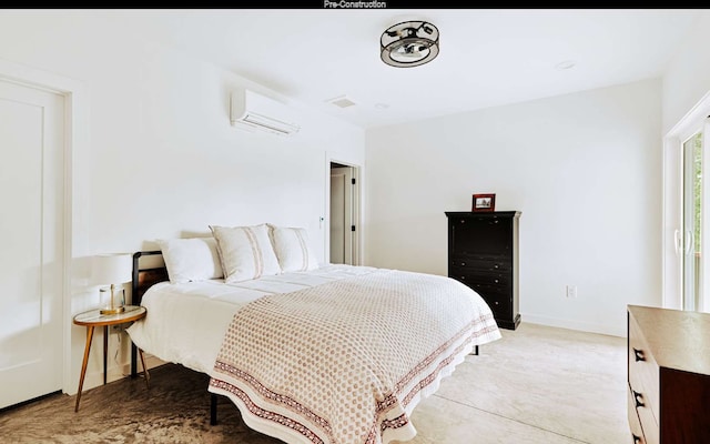 bedroom featuring a wall unit AC