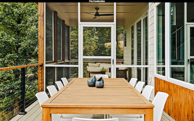 wooden deck with ceiling fan