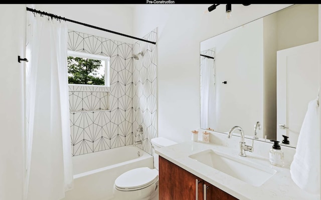 full bathroom featuring toilet, vanity, and shower / tub combo with curtain