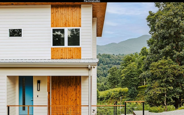 exterior space featuring a mountain view