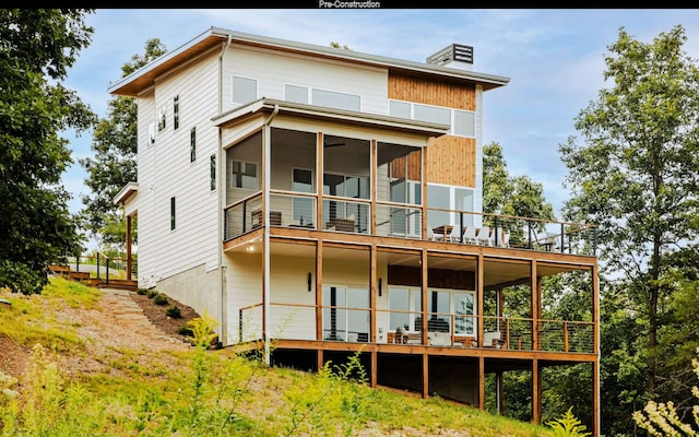 back of house with a balcony