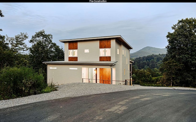 contemporary house with a mountain view