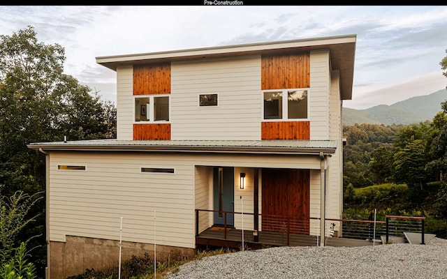 view of front facade featuring a mountain view