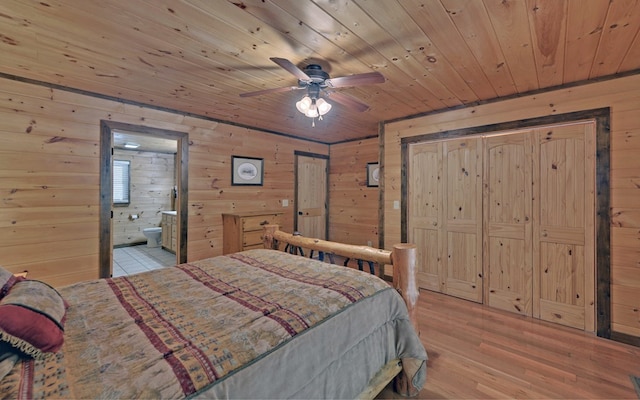 166 Dallas Ln, Blue Ridge, GA 30513 - bedroom with light wood-type flooring, ensuite bathroom, wooden walls, and wooden ceiling