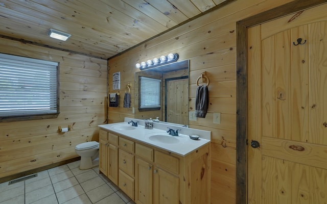 166 Dallas Ln, Blue Ridge, GA 30513 - bathroom with a sink, tile patterned floors, wood walls, and visible vents