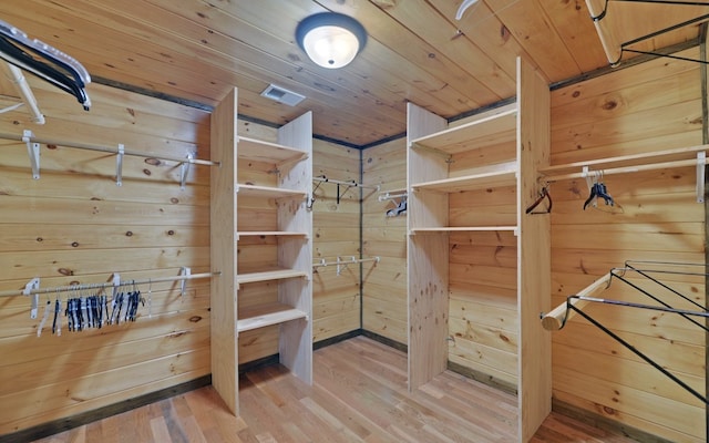 166 Dallas Ln, Blue Ridge, GA 30513 - walk in closet with visible vents and wood finished floors