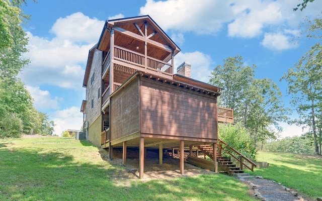 166 Dallas Ln, Blue Ridge, GA 30513 - rear view of house with a yard, a deck, stairway, and a chimney