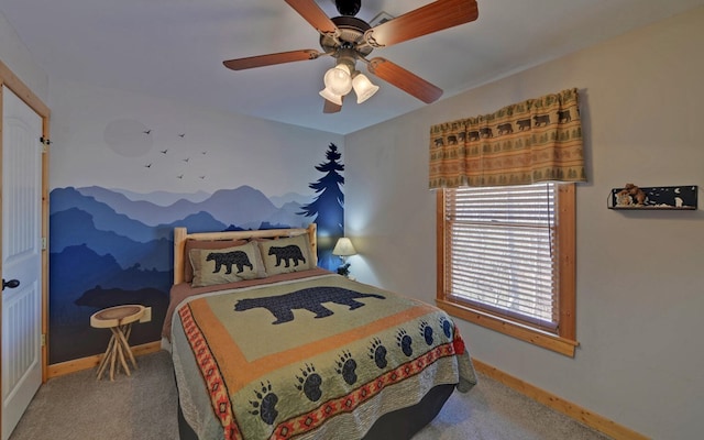 bedroom featuring baseboards, carpet floors, and ceiling fan