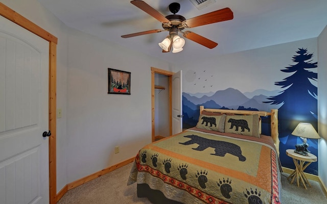 bedroom with visible vents, baseboards, carpet, and a ceiling fan