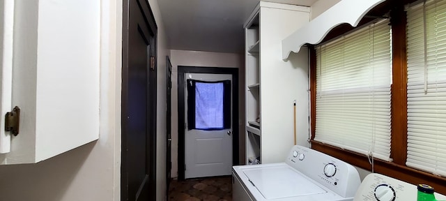 laundry room featuring washer and clothes dryer