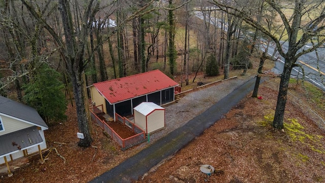 drone / aerial view with a view of trees