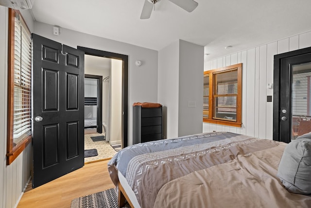 bedroom with ceiling fan and wood finished floors