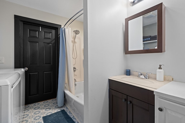 bathroom with shower / tub combo, visible vents, separate washer and dryer, and vanity