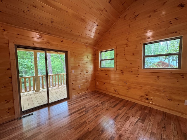 151 Martins Creek Ridge Rd, Murphy, NC 28906 - empty room with lofted ceiling, wood walls, and wood finished floors