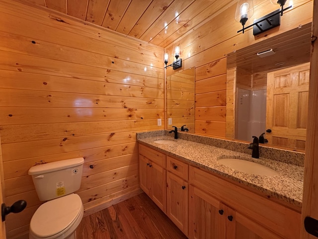 151 Martins Creek Ridge Rd, Murphy, NC 28906 - bathroom featuring toilet, wood finished floors, a shower, wood walls, and double vanity