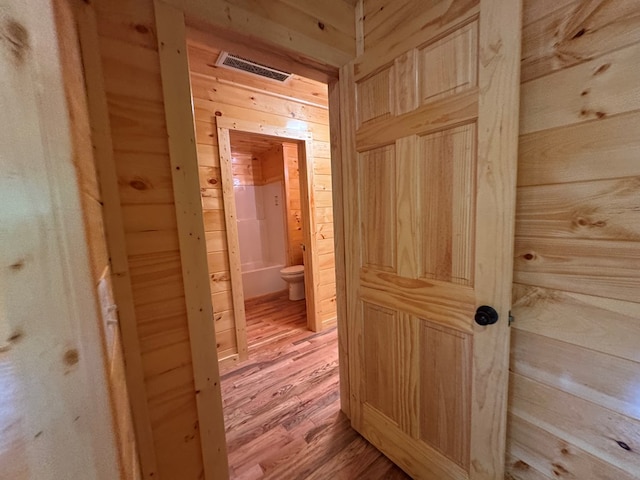 151 Martins Creek Ridge Rd, Murphy, NC 28906 - corridor with wood walls and light wood-style flooring