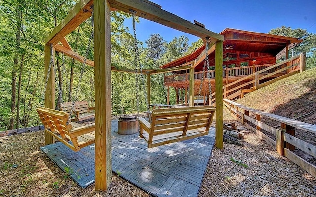 view of patio / terrace with an outdoor fire pit