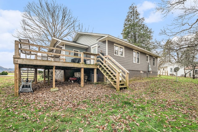 back of property with a deck