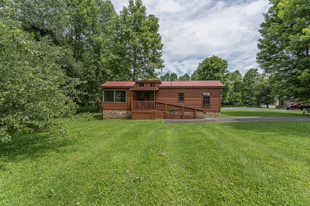 93 Lazy Bear Trl, Andrews, NC 28901 - rear view of property featuring a lawn, metal roof, and a wooden deck