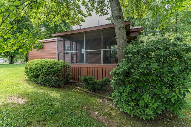 93 Lazy Bear Trl, Andrews, NC 28901 - view of home's exterior featuring a yard and a sunroom