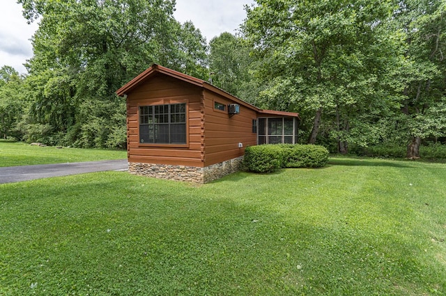 93 Lazy Bear Trl, Andrews, NC 28901 - view of property exterior featuring a yard and a sunroom
