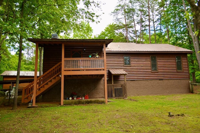 115 Black Oak Ridge Rd, Blue Ridge, GA 30513 - rear view of house featuring stairs, a lawn, crawl space, metal roof, and a deck