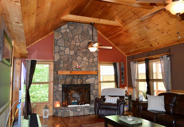 115 Black Oak Ridge Rd, Blue Ridge, GA 30513 - living area with ceiling fan, wooden ceiling with exposed beams, wood finished floors, a stone fireplace, and high vaulted ceiling