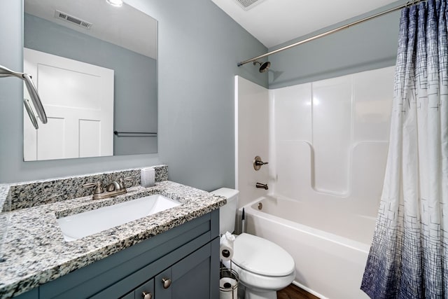 bathroom with shower / bath combo with shower curtain, toilet, visible vents, and vanity