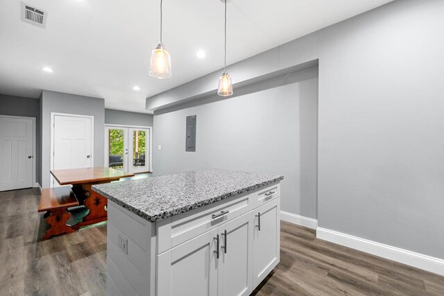 kitchen featuring visible vents, french doors, white cabinetry, and dark wood-type flooring