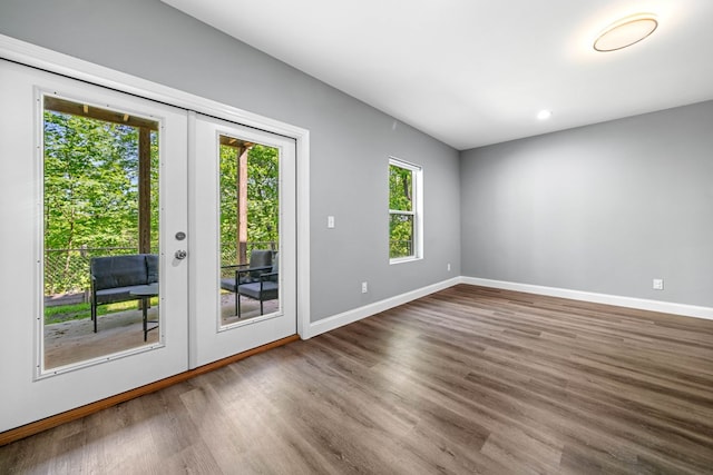 doorway featuring recessed lighting, baseboards, french doors, and wood finished floors