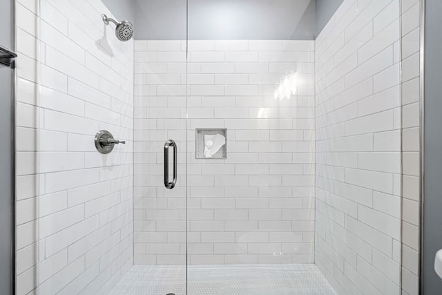 full bathroom with a shower stall