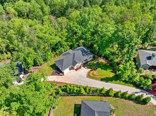 bird's eye view with a forest view