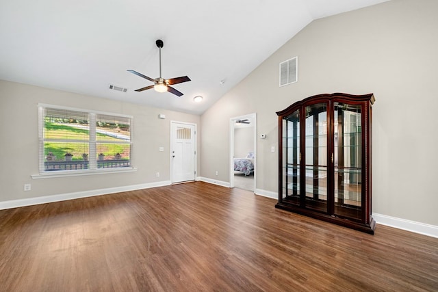 unfurnished living room featuring visible vents, ceiling fan, and wood finished floors