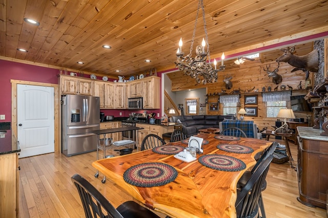 dining area featuring a notable chandelier, recessed lighting, light wood-style floors, wooden ceiling, and stairs