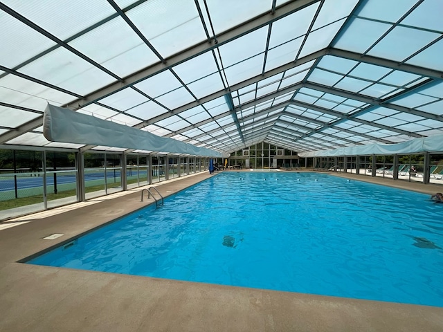 view of pool with a lanai