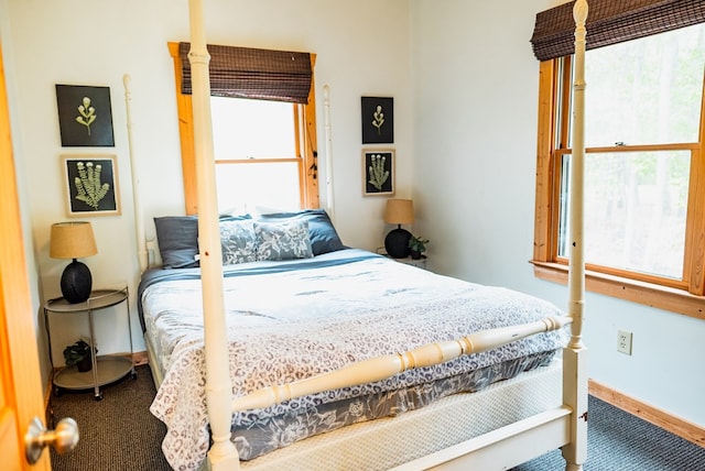 bedroom featuring carpet