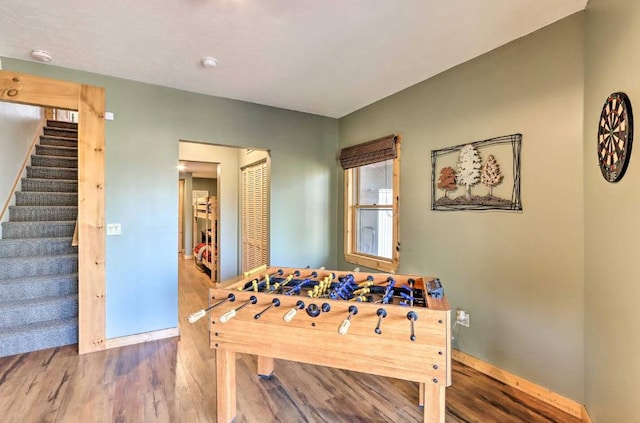 game room with hardwood / wood-style flooring