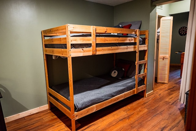 bedroom featuring hardwood / wood-style floors