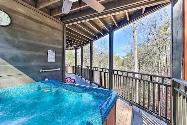 view of pool featuring ceiling fan