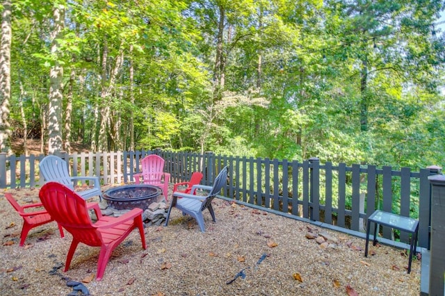 view of patio with an outdoor fire pit