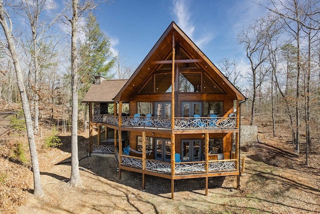 rear view of house featuring a patio