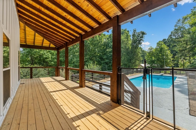 109 Lakeview Ct, Ellijay, GA 30540 - deck featuring view of wooded area and an outdoor pool