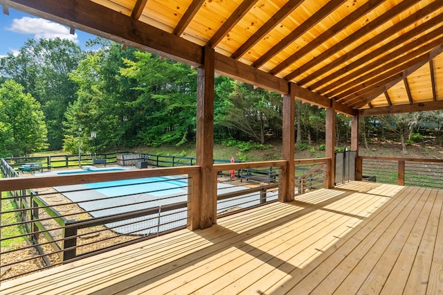 109 Lakeview Ct, Ellijay, GA 30540 - wooden terrace featuring view of scattered trees and a fenced backyard